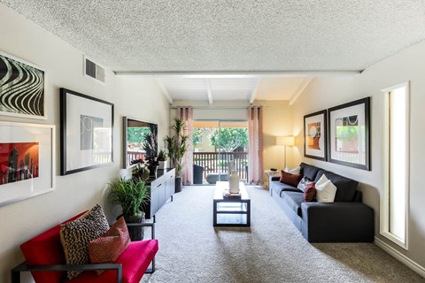 a living room with a couch and a table